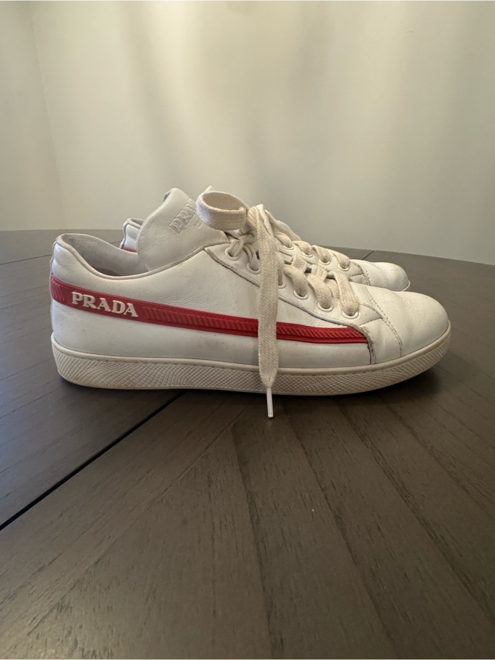 Prada White Leather Low-Top Sneakers with Red Side Stripe